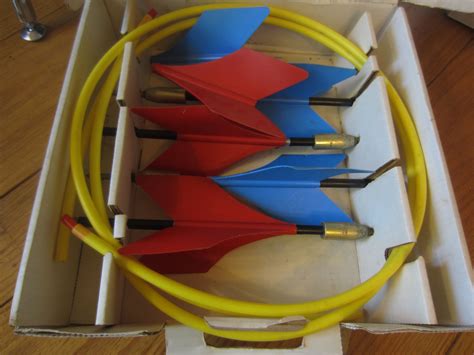 These are 1970s sets of lawn darts. You get an original set of Jarts in the box, complete with 4 darts, two spare replacement fins and two rings. Also included is a set of 4 Intex …